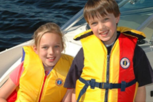 Two kids wearing lifejackets